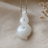 Carved Swirl Jade Pendant